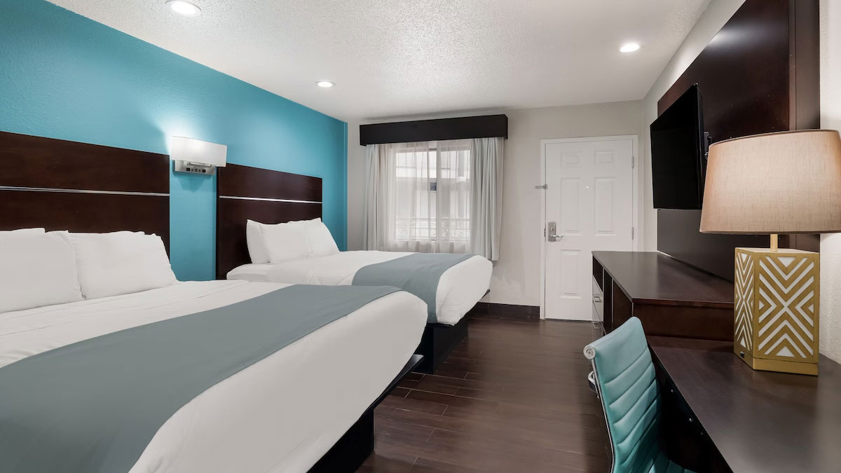 Modern guest room with two beds